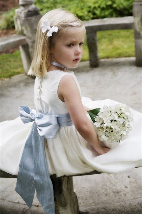 girls in white dresses with blue satin sashes amy by little bevan flower girl dresses blue