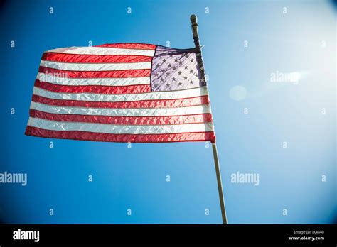 American Flag Blowing In Wind Stock Photo Alamy