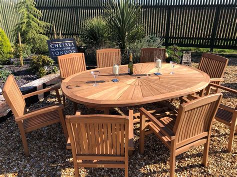 Teak Garden Furniture Premium Oval Table With 8 Teak Stacking Chairs