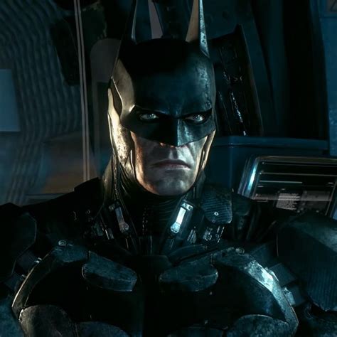 The Dark Knight Batman Character Is Holding His Hands On His Chest And