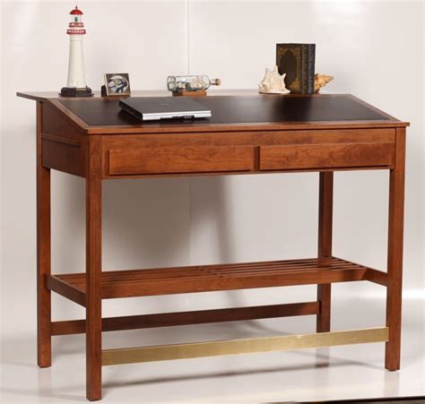 A small standing desk is perhaps the healthier choice, as it allows you to work in a standing position, encouraging some form of movement throughout your workday. Winston Churchill Stand-up Desk | Stand up desk, Desk ...