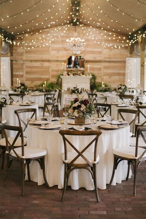 chic rustic barn wedding reception ideas with string lights emmalovesweddings