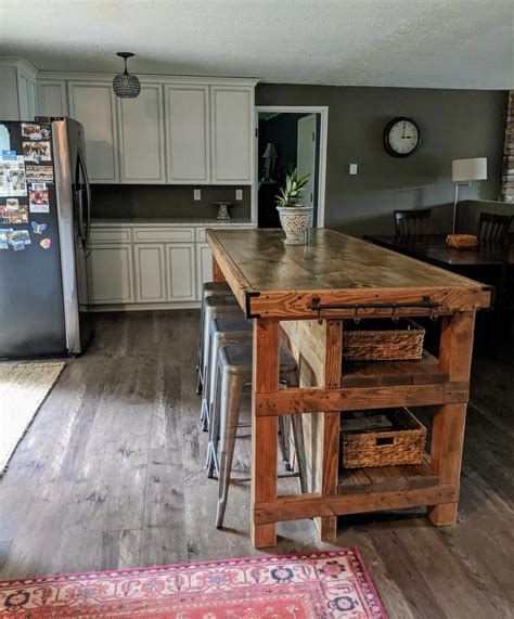 Whether you need kitchen islands with seating and storage or enjoy the character and design statement of a freestanding kitchen island. Wood kitchen island with seating area in 2020 | Wood ...