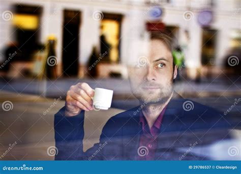 Businessman Drinking Espresso Coffee In The City Cafe Stock Image