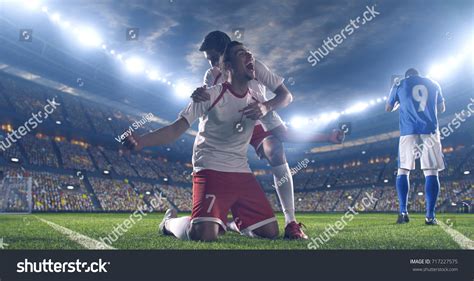 Soccer Players Celebrate Victory During Soccer Stock Photo 717227575