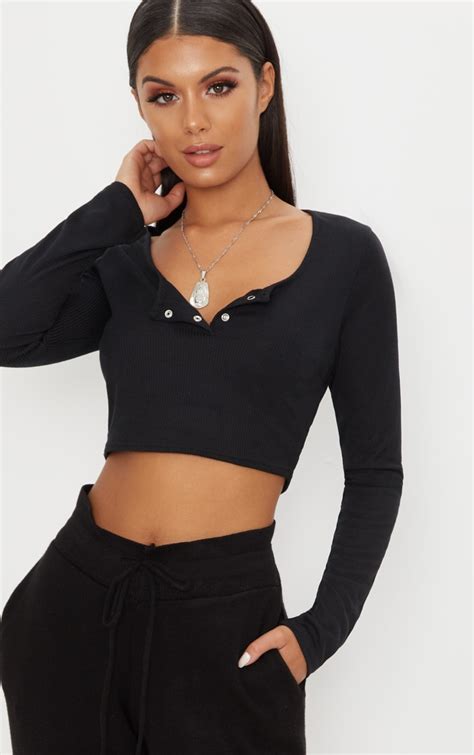 Black Rib Popper Front Long Sleeve Crop Top Prettylittlething Aus