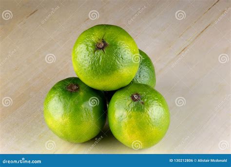 Fresh Limes On A Wooden Surface Stock Photo Image Of Fruity