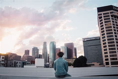 5760x1080px Free Download Hd Wallpaper Man Sitting On Ledge Facing