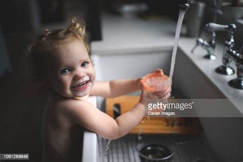filling water glass sink photos and premium high res pictures getty images