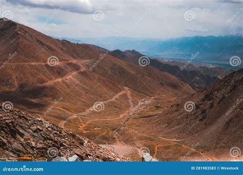 Scenic View Of Barren Mountains Under A Cloudy Sky Stock Image Image