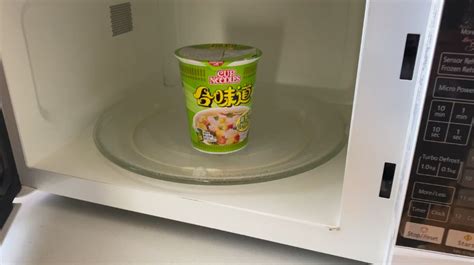 It's a good idea to break up the noodles so they are all in the water and receive equal amounts of step 4: ramen-cup-noodles-in-microwave - The Cooler Box