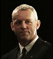 David Morse As Brutus "Brutal" Howell With The Smirk On His Face David ...