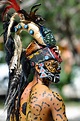Mayan Warrior in traditional dress, performs an ancient ritual dance ...