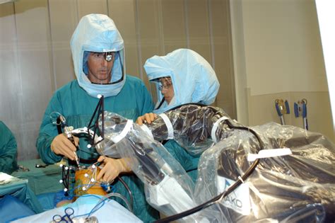 Computer Assisted Total Knee And Robotic Assisted Partial Knee Surgery