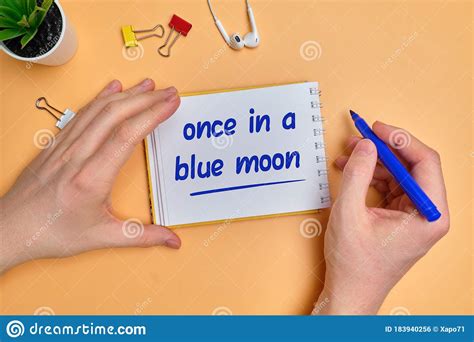 English Idiom Hand Lettering About Time Once In A Blue Moon On Wooden