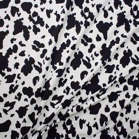 Cali Fabrics Black And White Cow Print Stretch Cotton Jersey Fabric By