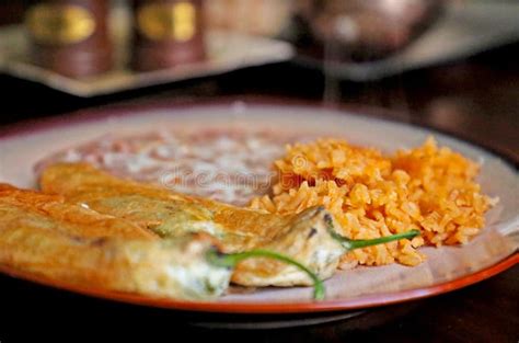 Chile Relleno Plate With A Side Of Rice And Beans Stock Image Image