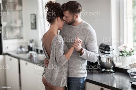 Intimate Couple Dancing In The Kitchen Stock Photo Download Image Now