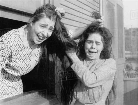 Two Women Fighting And Pulling Each Others Hair Stock Photo Dissolve