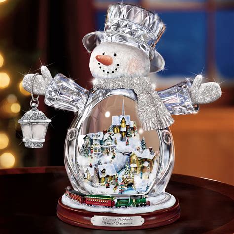 The Thomas Kinkade Illuminated Crystal Snowman Hammacher Schlemmer