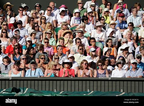 Spectators On The Centre Court At The Wimbledon Championships Stock