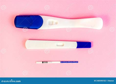 Different Types Of New Pregnancy Tests For Woman On Light Pink