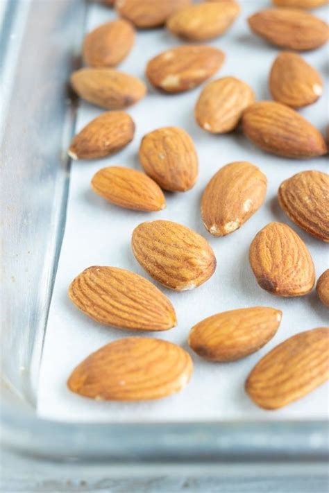 How To Roast Almonds In The Oven Recipe Roasted Almonds Almond Snacks