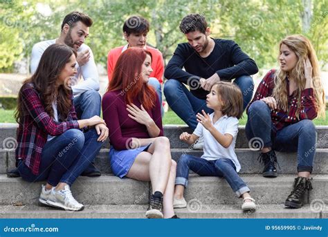 Group Of Young People Together Outdoors In Urban Background Stock Image