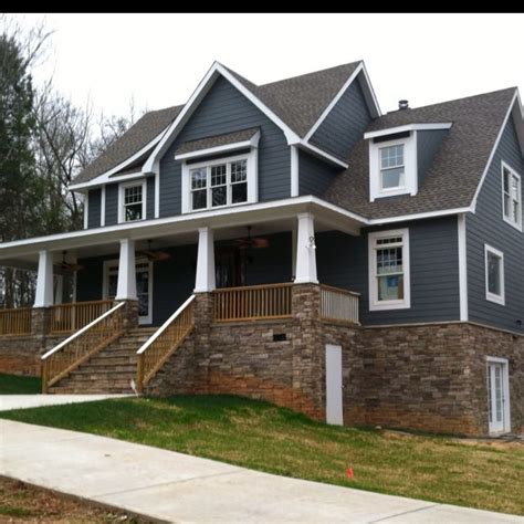 Find a hue for the exterior of your house that you—and homebuyers—will love. Image result for best stone color blue siding | Gray house ...