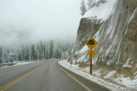 Traffic Signs On Icy Mountain Road Stock Photo Image Of Curve Storm