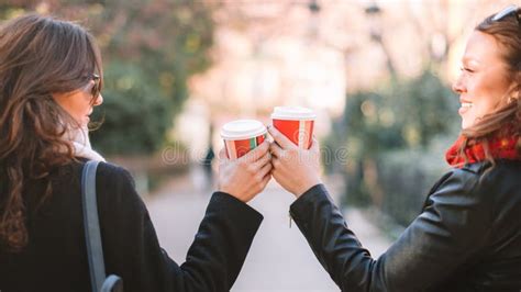 Two Friends Drinking Take Away Coffee Stock Image Image Of Caps
