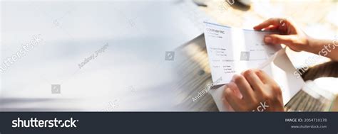 Paycheck Open Envelope Holding Payroll Cheque Stock Photo 2054710178