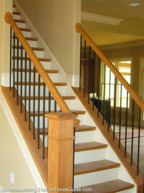 Spindles, which are vertical wood or metal structures, are interspersed between posts to provide a safety barrier along. just like ours | Staircase design, Staircase remodel, Open ...