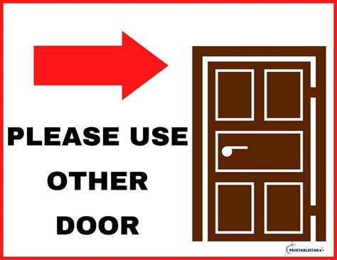 A Sign That Says Please Use Other Door With An Arrow Pointing To The