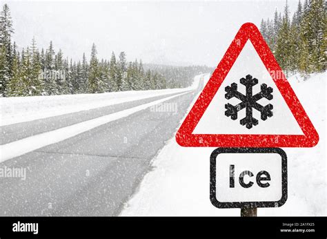 Snow Covered Road With Traffic Sign Hi Res Stock Photography And Images