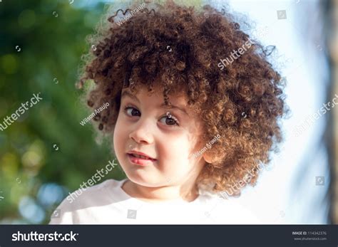 Cute Curly Hair Light Skin Brazilian Boy Closeup Stock