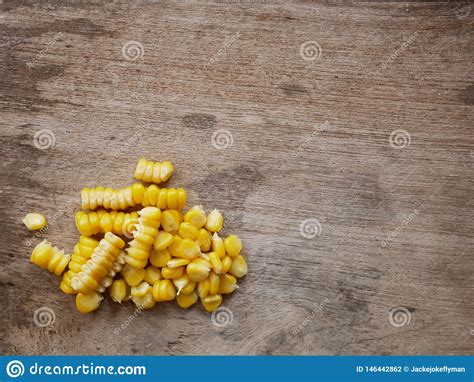 Sweet Corn On Dark Wood Table With Empty Place Editorial Photography