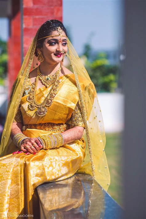 Bride In Gold Saree South Indian Bride Indian Bridal Dress Bridal