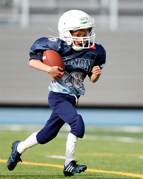 Boy Playing American Football