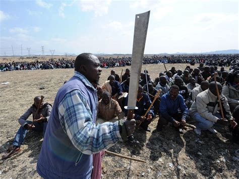 marikana killings inquiry blames police for deaths of 34 striking workers at south african