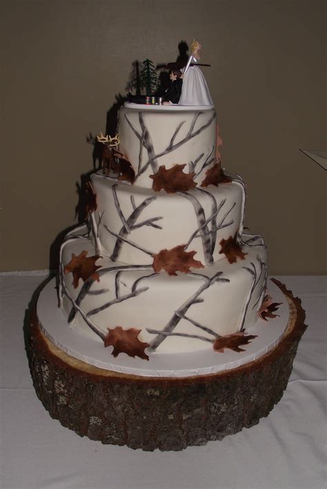 This was made for a man that likes to hunt and who is also in law enforcement. camo wedding cake ideas - Wedding Decor Ideas
