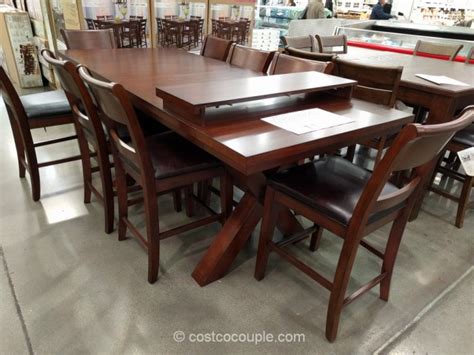 The table and chair legs are fitted with rubber protective foot pads on that can protect your floor from scratches, while ensuring the table and chairs maintain the stability. Hillsdale Furniture 9-Piece Counter Height Dining Set