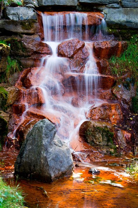 Water Falling Over Red Rocks Stock Photo Image Of Rocks