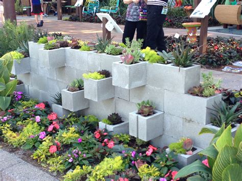 They are soo easy to make at home without costing you the beautiful cinder block decorating ideas to create a festive cheerful touch to your patio. Concrete Retaining Wall Planters - retainingwall resolved ...