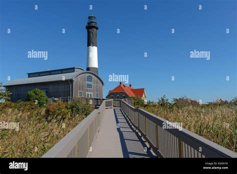 The Fire Island Lighthouse As Seen From The Nature Boardwalk In Fire