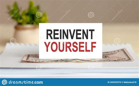 Text Note Reinvent Yourself Business Concept On Notepad Stock Photo