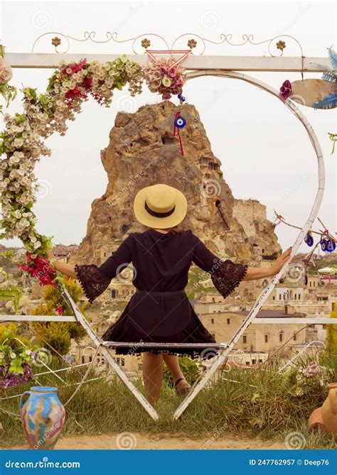 Woman In A Hat On The Terrace In Cappadocia Turkey Stock Image Image