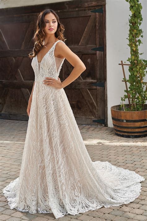 This strapless, lace wedding dress is the perfect gown for the bride aiming for a more causal look on her wedding day. T212010 Romantic Embroidered Lace A-line Wedding Dress ...