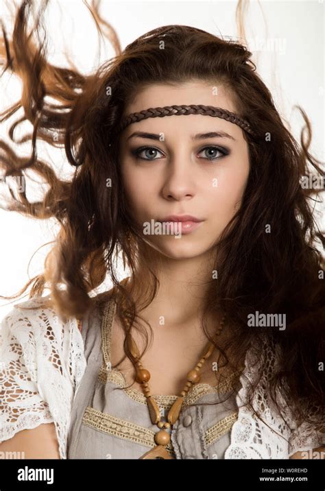 Young Beautiful Hippie Boho Woman With Fluttering Hair Having Fun Poses