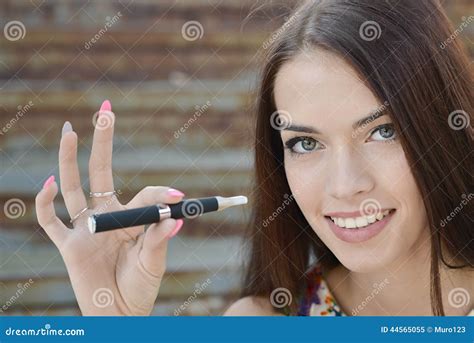 Young Woman Smoking Electronic Cigarette E Cigarette Stock Image